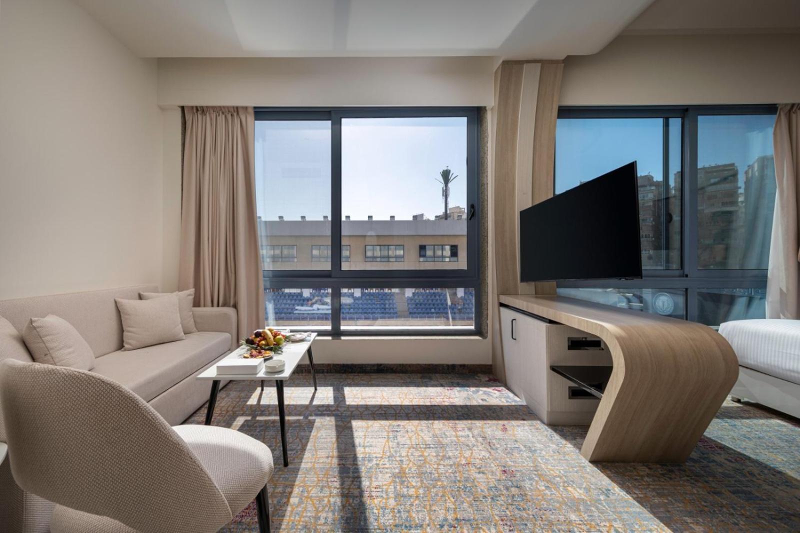 Premium Room Two Single Beds Sofa Bed Pool View,1699796678:JPEG