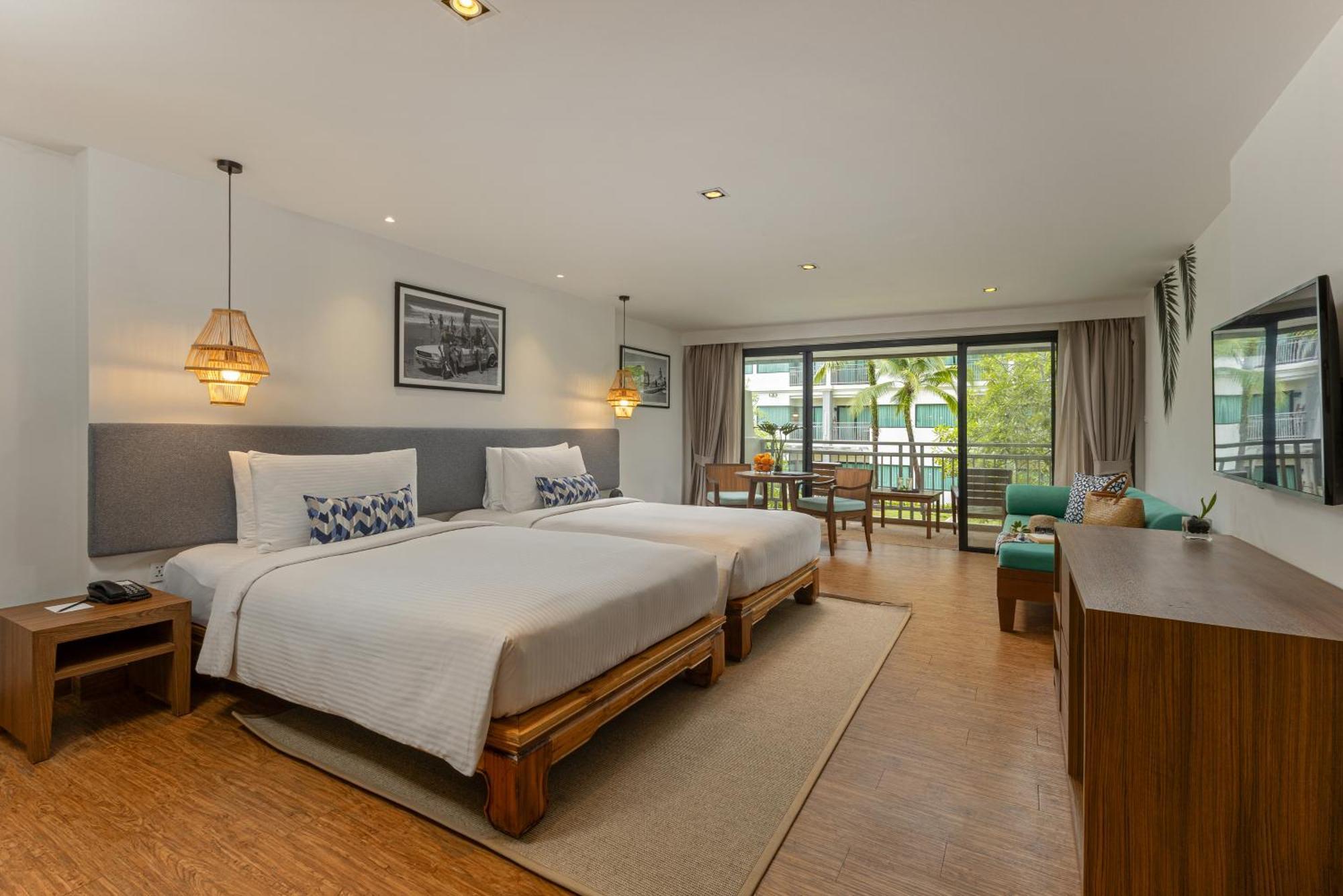 Premier Kamer met 2 Aparte Bedden en Tuinbalkon