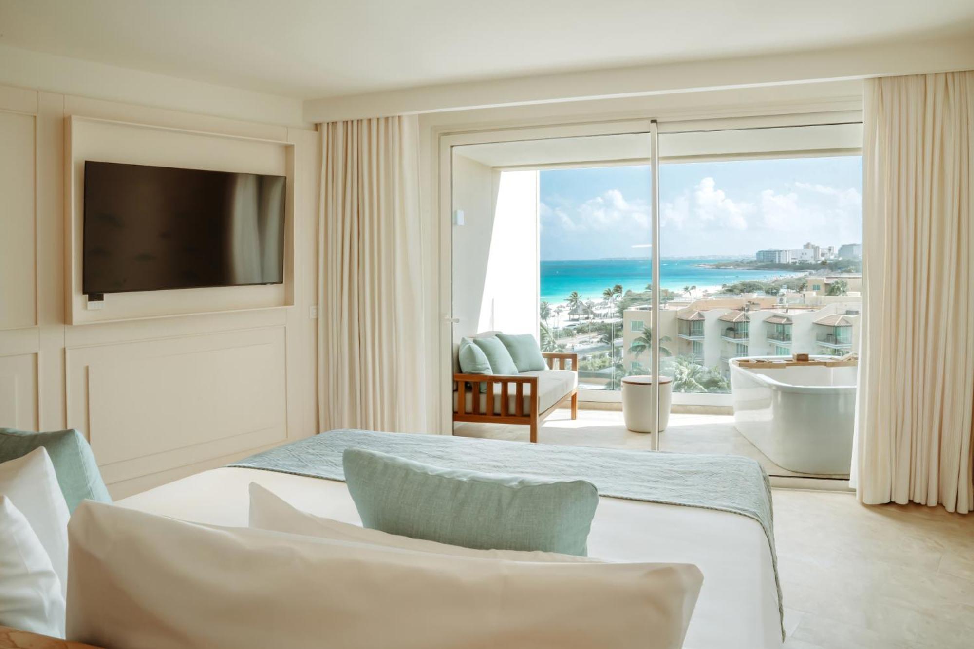 Suite con mayordomo y vistas laterales al mar - Cama extragrande y cama individual