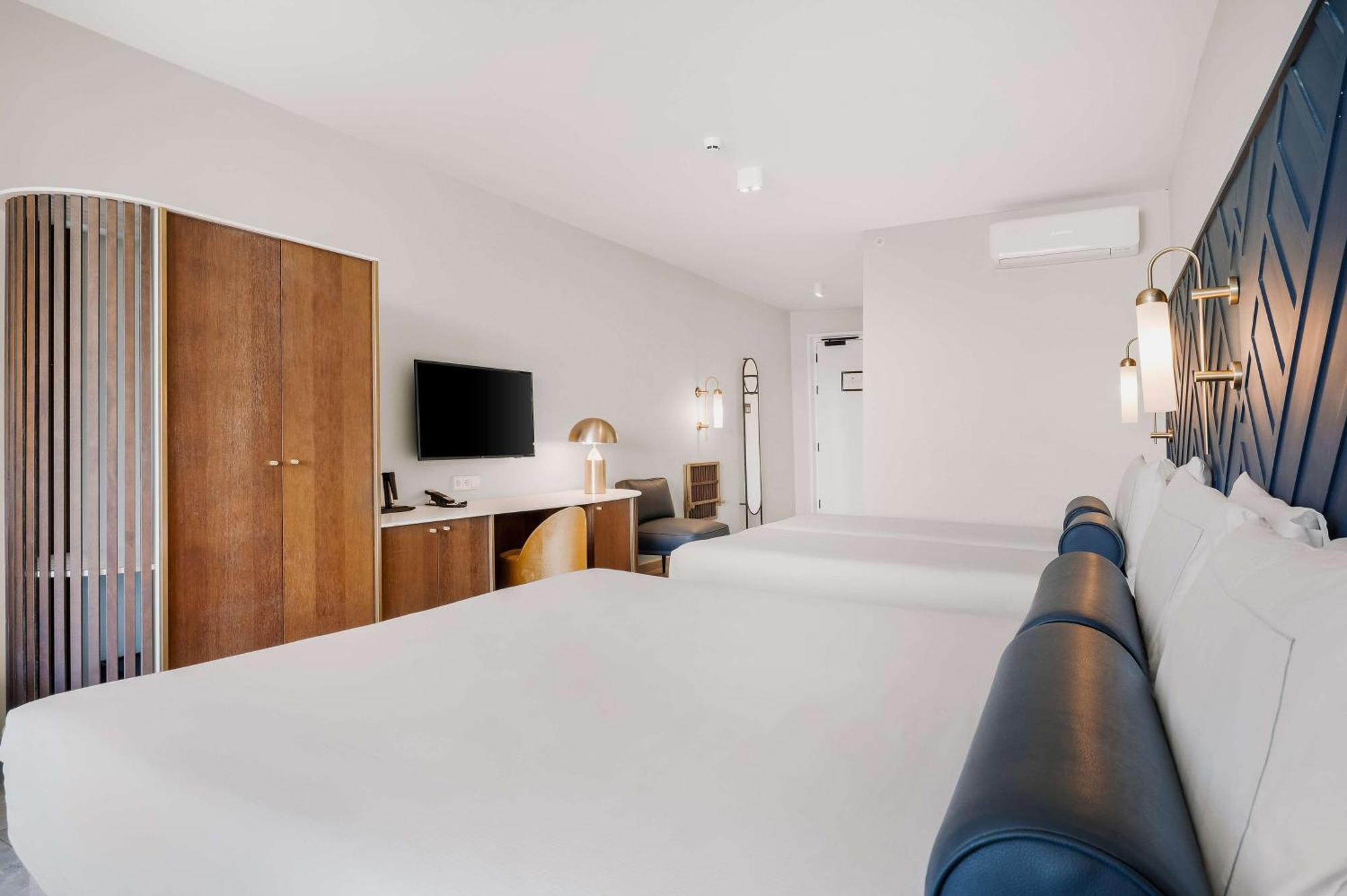 Quarto com 2 Camas King-size