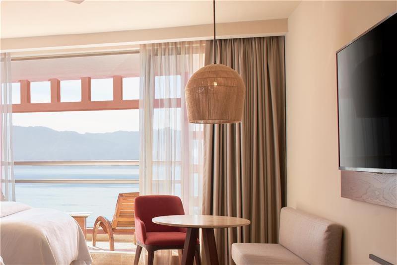 Junior Suite with Two Double Beds and Partial Ocean View